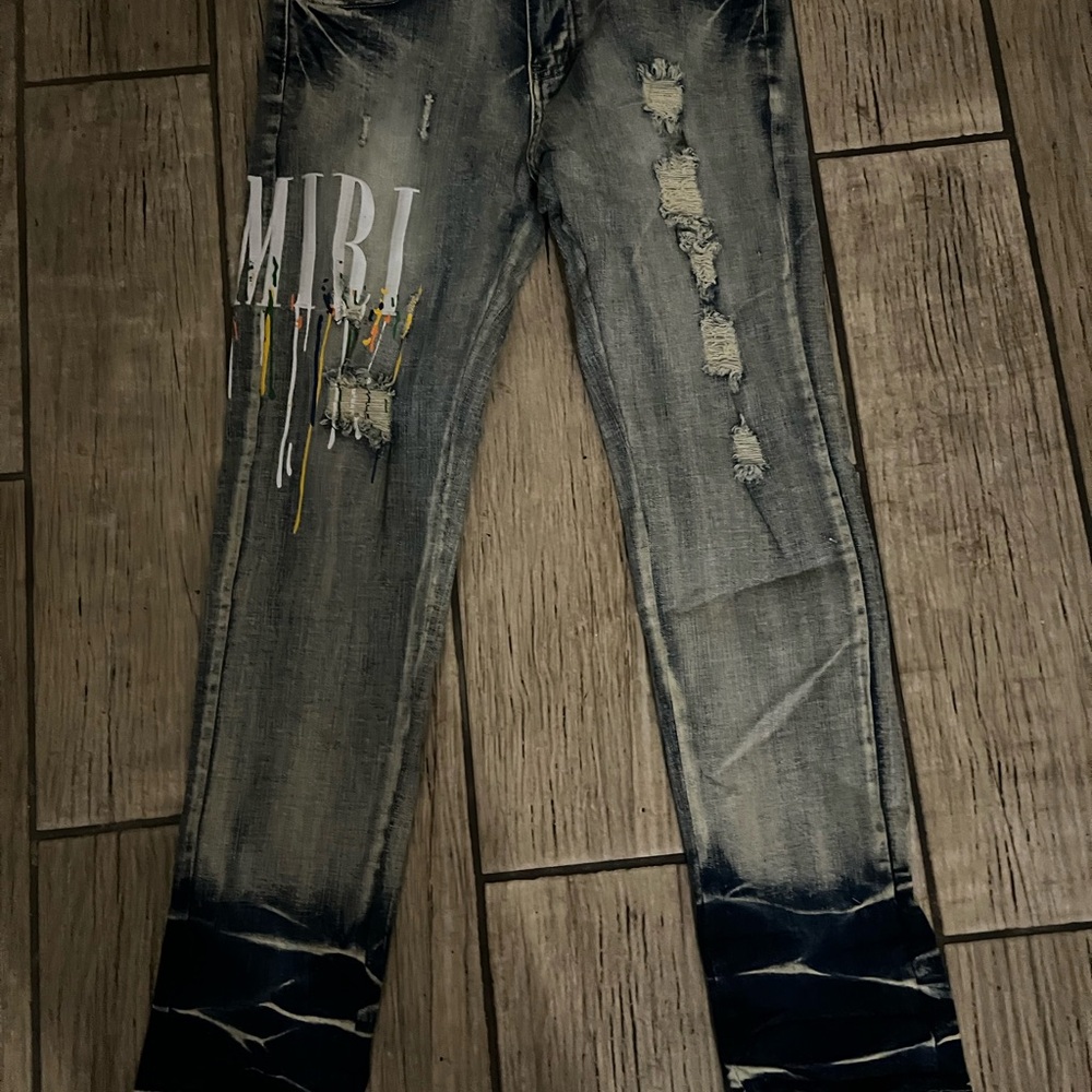 AMIRI Distressed Blue and White Jeans